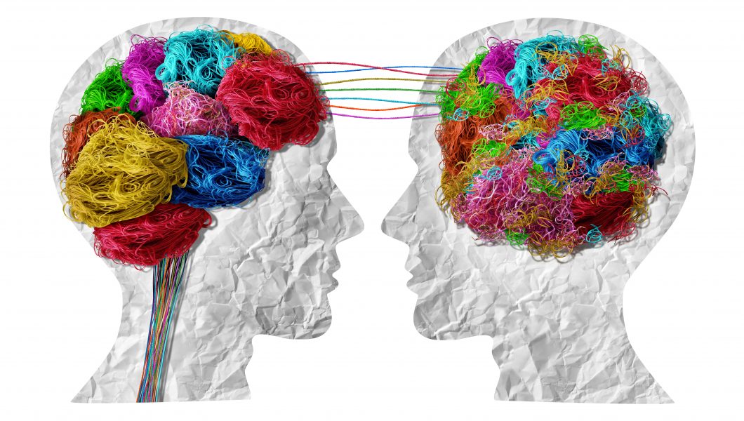Psycho Therapy or psychotherapy and therapeutic counseling Concept as a neurology or psychology symbol fordual personality and mental disorder as bipolar or mood swings and brain confusion with tangled and untangled mind.
