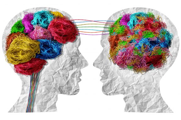 Psycho Therapy or psychotherapy and therapeutic counseling Concept as a neurology or psychology symbol fordual personality and mental disorder as bipolar or mood swings and brain confusion with tangled and untangled mind.